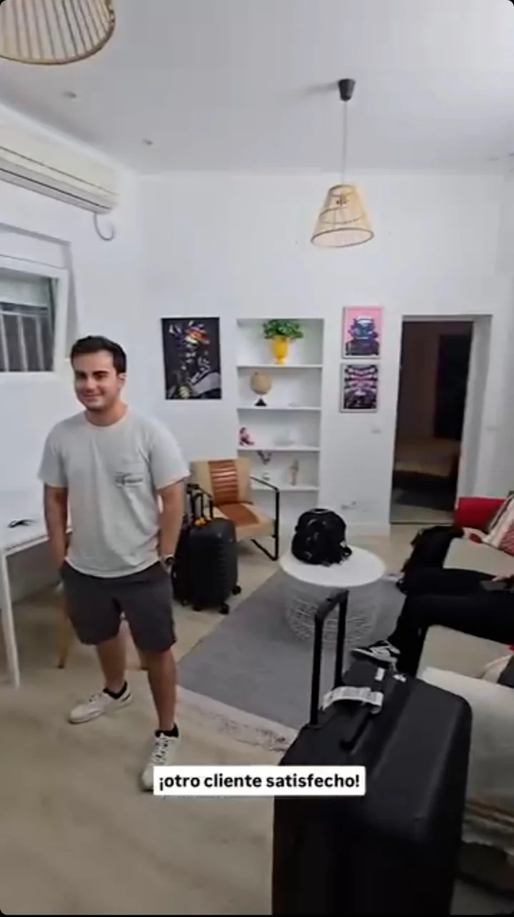 Client arriving at his new home with luggage